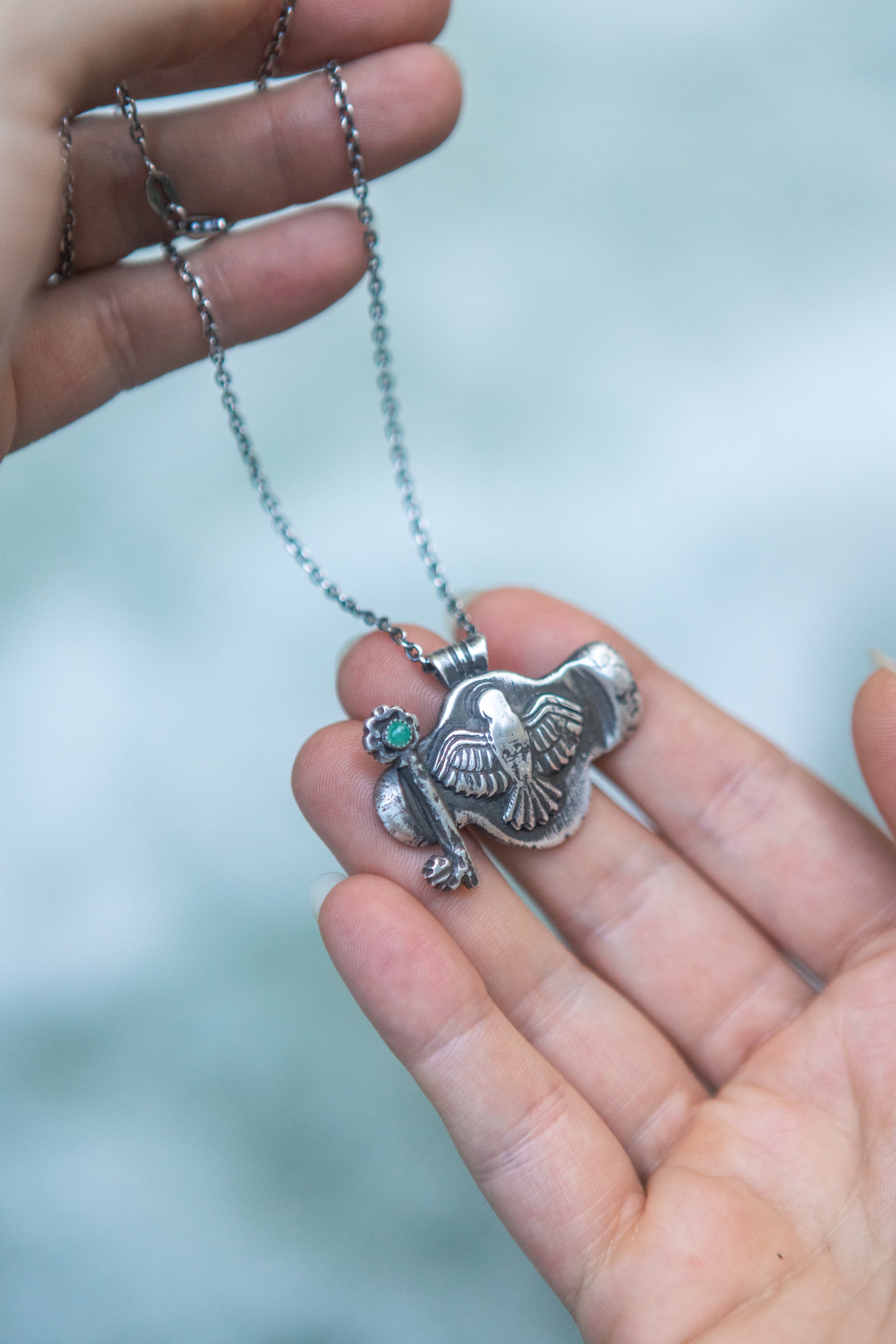 Ancient Immer Hawk Amulet - Antiqued Silver with Emerald