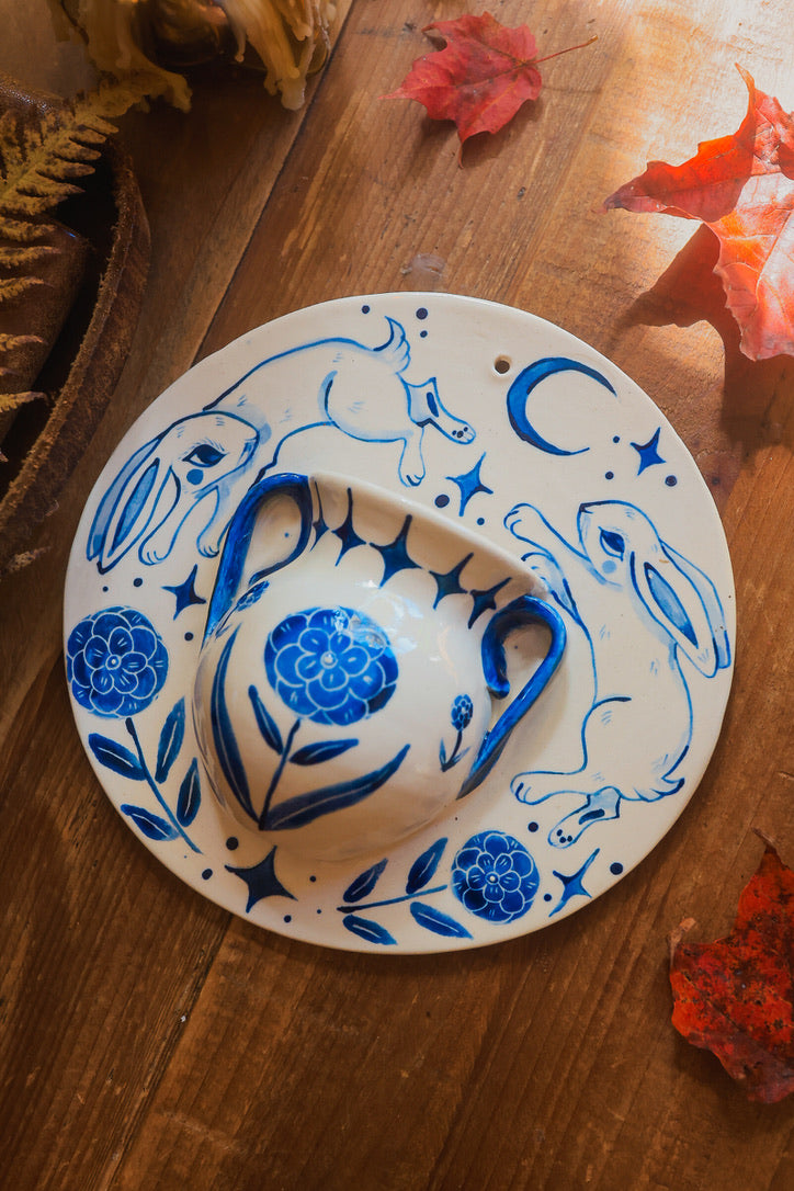 Meadow Rabbits of Morwain Wall Pocket in Painted Blue-On-White Porcelain