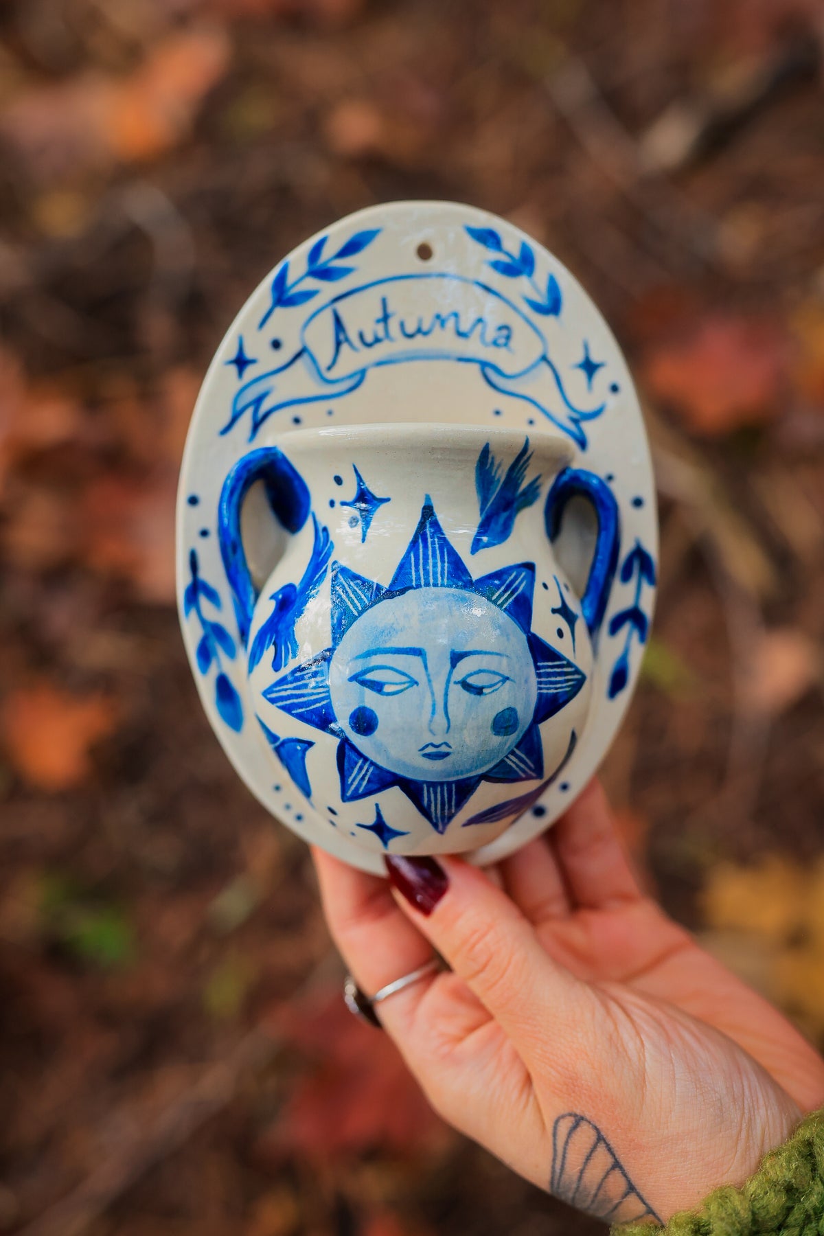 September Autumna Sun Wall Pocket in Painted Blue-On-White Porcelain