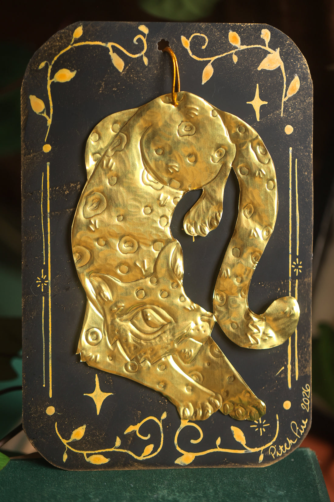 Golden Snow Leopard Talisman in Antique Brass