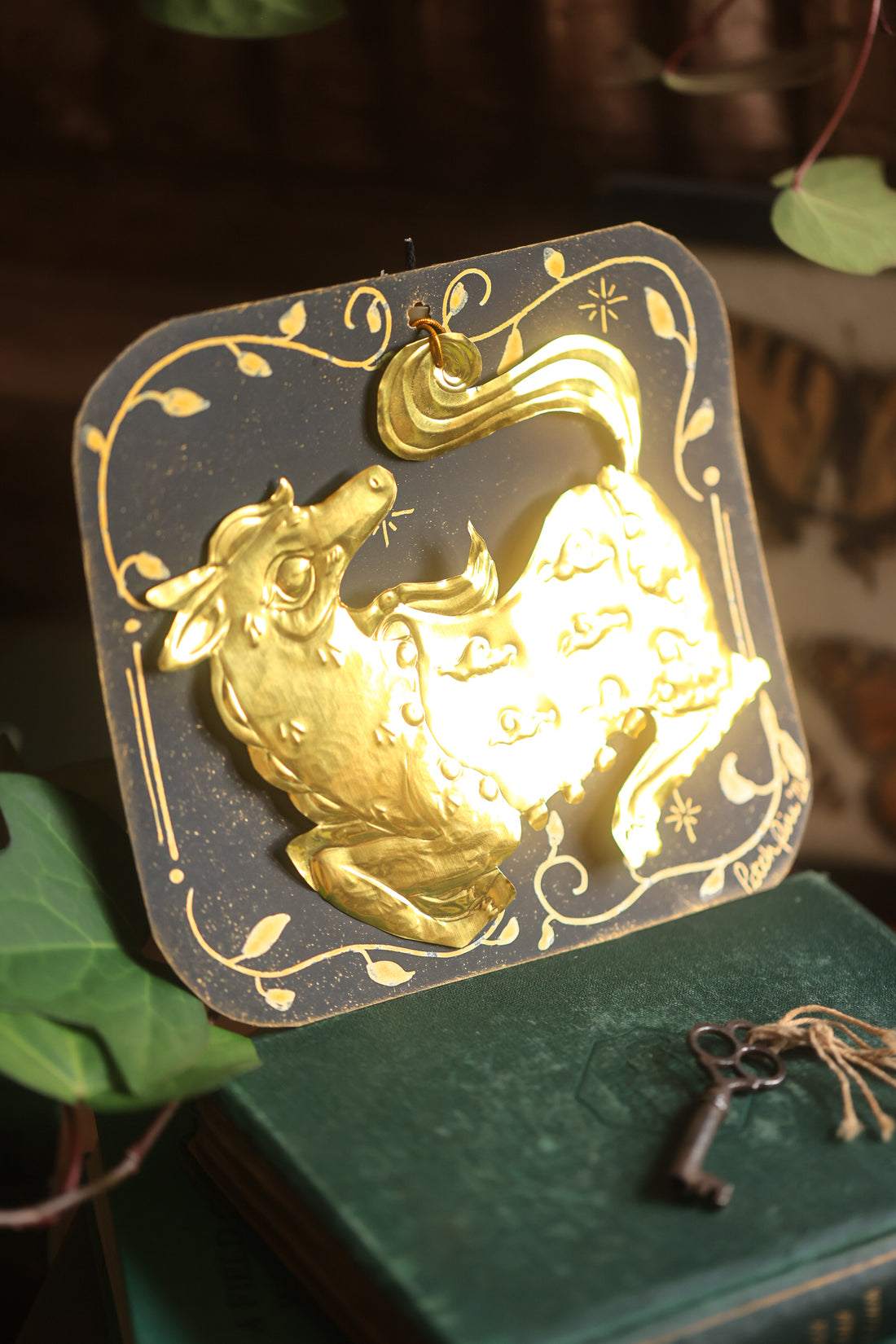 Golden Wind Horse Talisman in Antique Brass