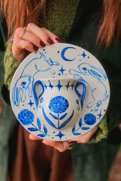 Meadow Rabbits of Morwain Wall Pocket in Painted Blue-On-White Porcelain