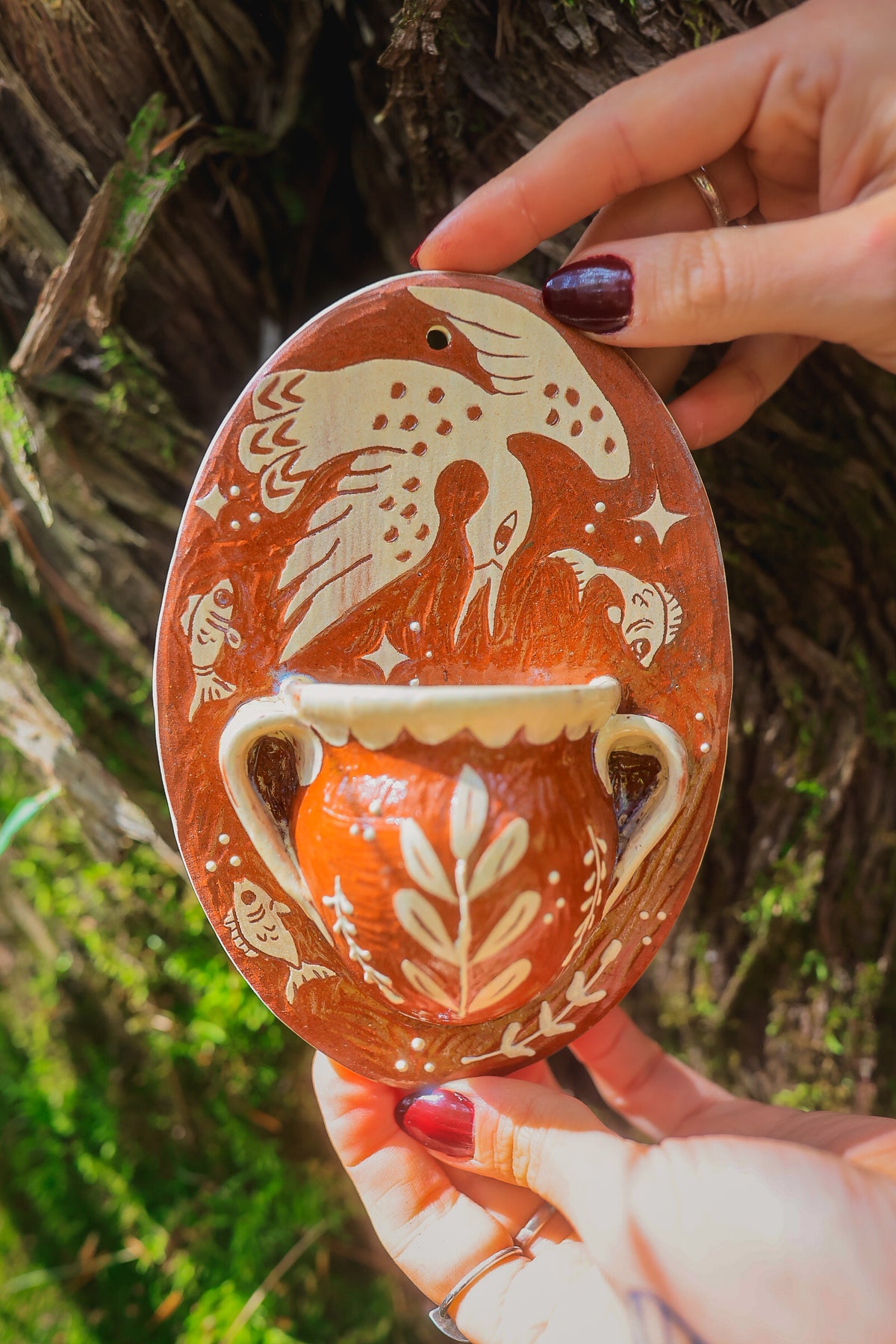 Autumn Lake Loon Wall Pocket in Terracotta