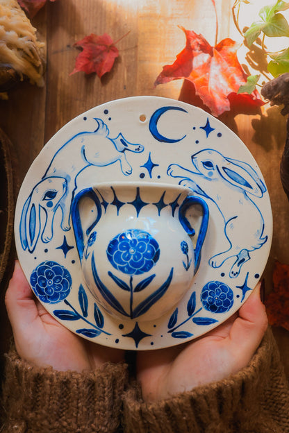 Meadow Rabbits of Morwain Wall Pocket in Painted Blue-On-White Porcelain