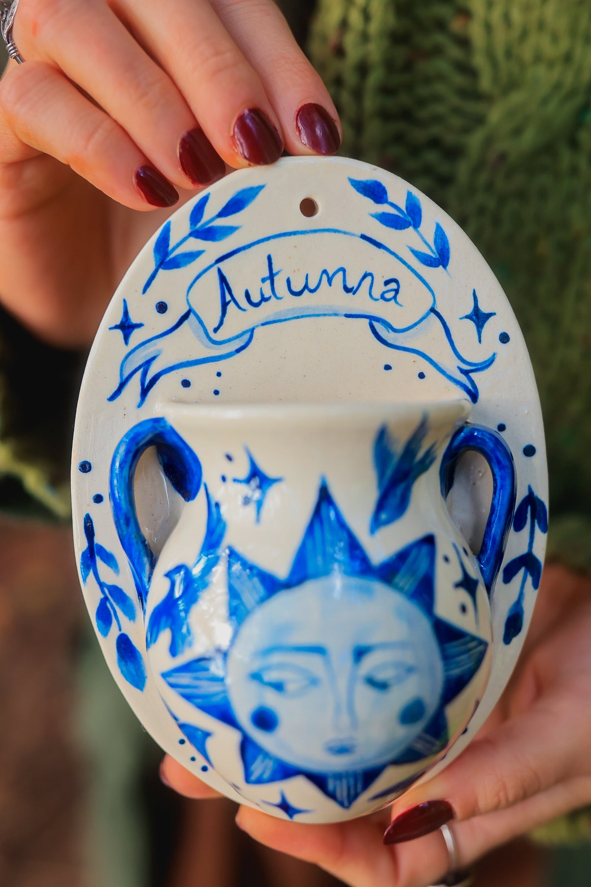 September Autumna Sun Wall Pocket in Painted Blue-On-White Porcelain